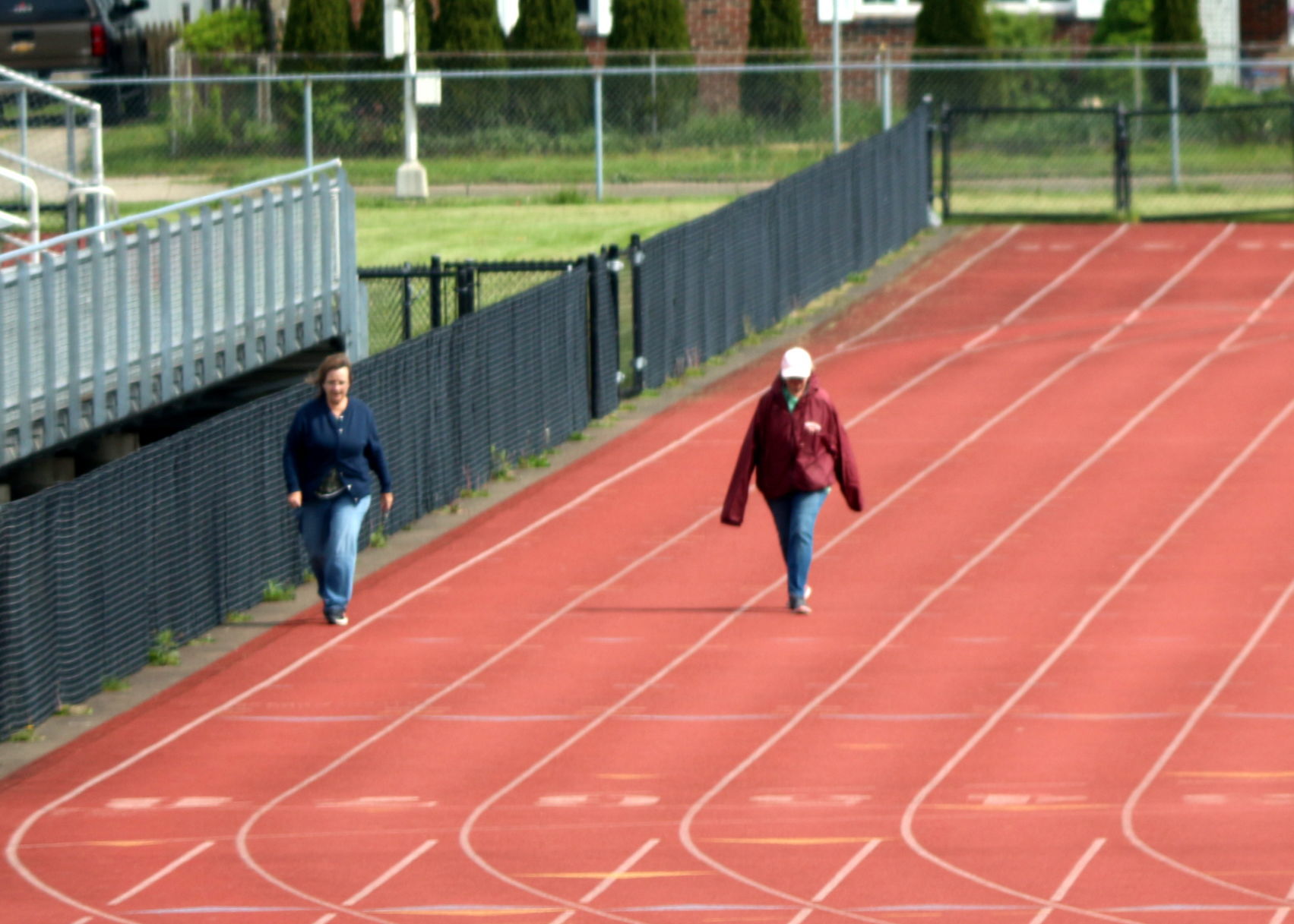 Walking Olean school track with social distancing